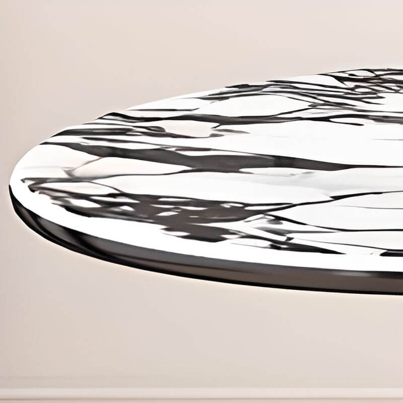 Oval marble dining table set with dual footing, solid back panel, and cushioned chairs