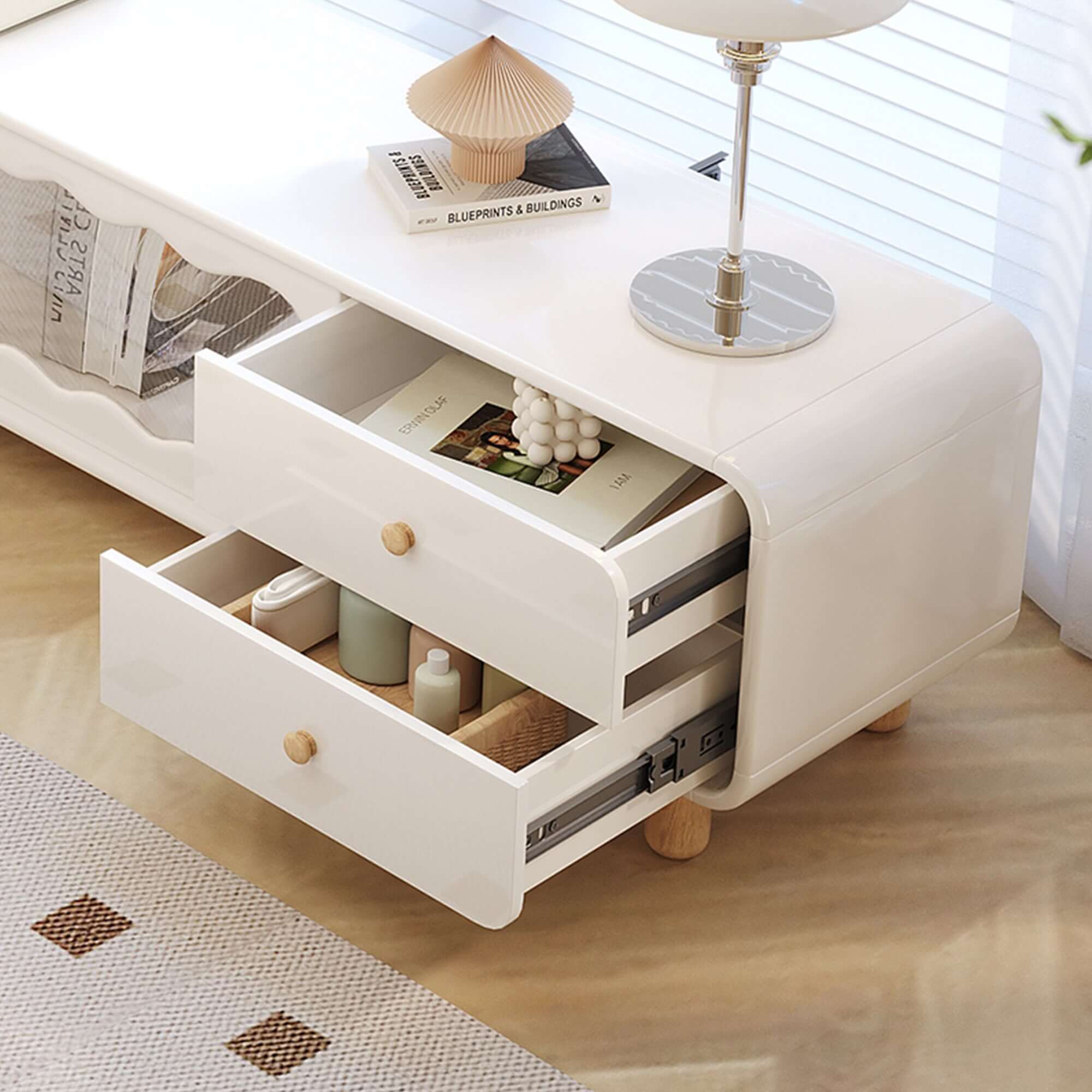 Cream wooden TV stand featuring sliding door and drawers for stylish storage