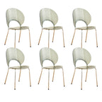 Stackable Scandinavian style dining chair with plastic seat, acrylic back, and silver legs