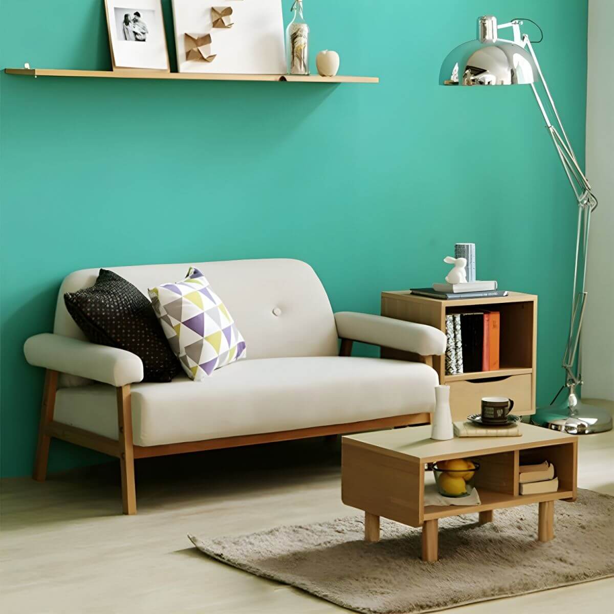 Black Scandinavian style small sofa with wood frame and faux leather upholstery