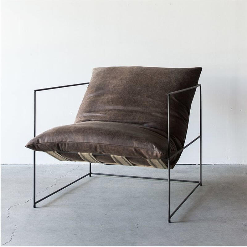 Industrial metal armchair with pillow back