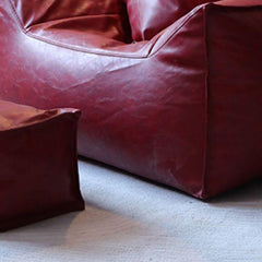 Bean bag chair placed beside a modern coffee table