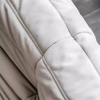 Interior view of a cozy room with a leather beanie chair