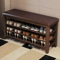 Accent bench with shoes and bags in entryway setting