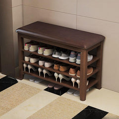 Accent bench with shoes and bags in entryway setting