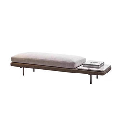 Short profile grey upholstered sitting bench