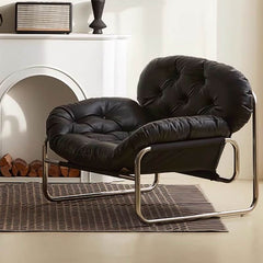 Elegant accent chair with a tufted back and armrests