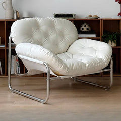 Elegant accent chair with a tufted back and armrests