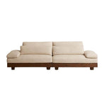 Cream Art Deco floor sofa with pillow back, pillow top arms, slipcover, and multiple pillows for seating 2 to 4 people