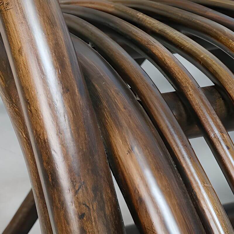 Stylish Cherry Wood rocking chair with rattan details