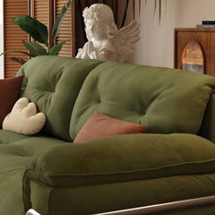 stylish living room with green sofa