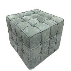 Light blue square ottoman with decorative stitching