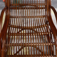 Elegant dark brown wicker chair with hollow back design