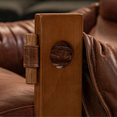 Detail of the untufted biscuit back of the armchair