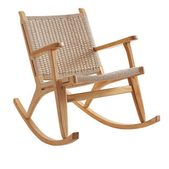 Cherry wood wicker rocking chair on porch