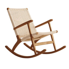 Relaxing wicker rocking chair perfect for outdoor spaces