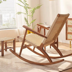 Cherry wood wicker rocking chair on porch