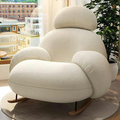 Stylish indoor rocking chair in white upholstery