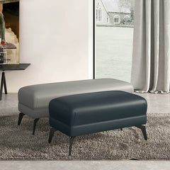 Black rectangular wood footstool in modern living room