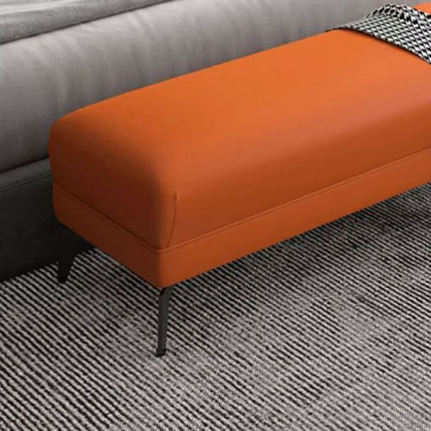 Comfortable wood footstool in cozy setting