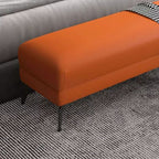 Comfortable wood footstool in cozy setting