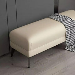 Modern footstool accenting a neutral color palette