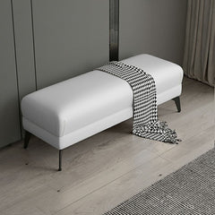 Black footstool showcasing metal legs