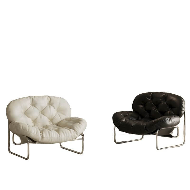 Contemporary black cream chair with decorative stitching