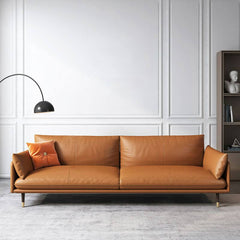 Brown leather sofa from a side angle