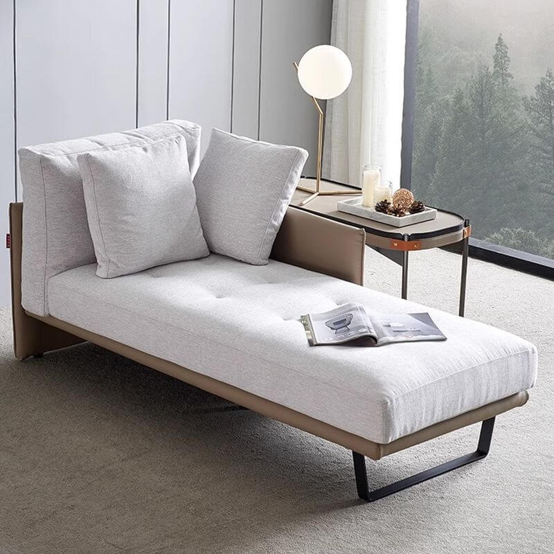 Brown and white padded chaise lounge