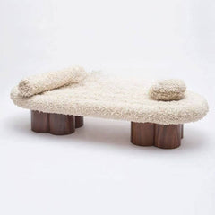 beige upholstered sitting bench with arms