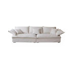 Smart slipcover on ivory sofa for easy maintenance