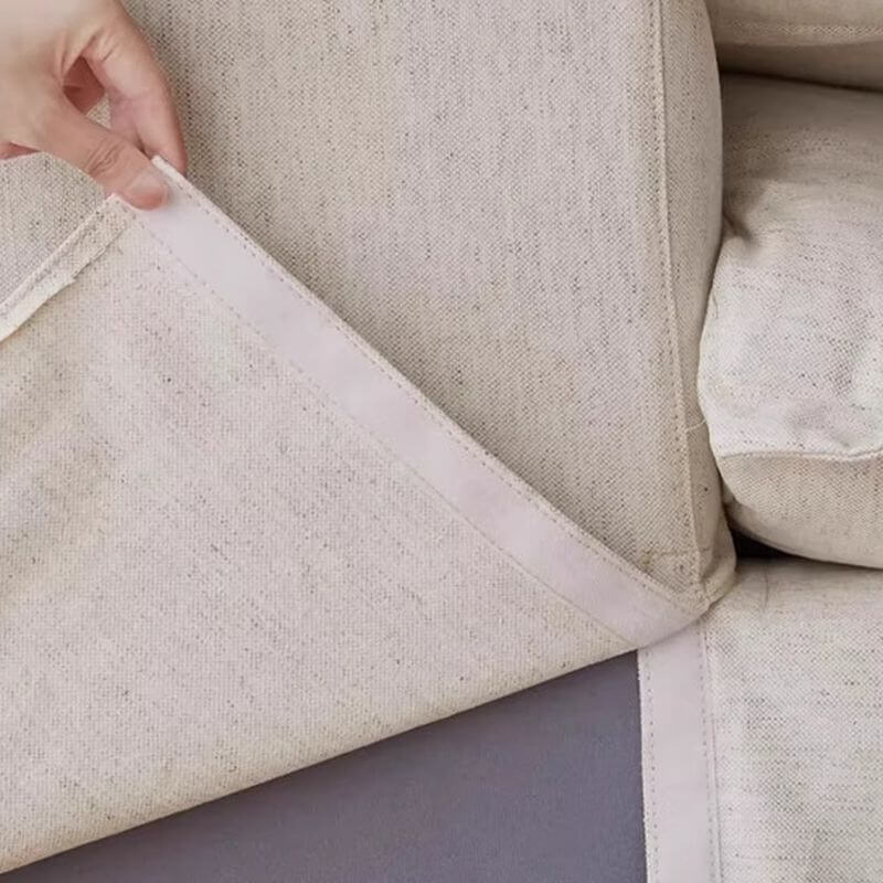 Stylish linen and cotton sofa in bright living area