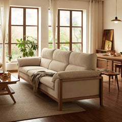 Scandinavian style ivory sofa with plush cushions