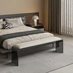 Grey upholstered accent bench in cozy corner