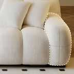 Inviting Seating Arrangement with Ivory Couch