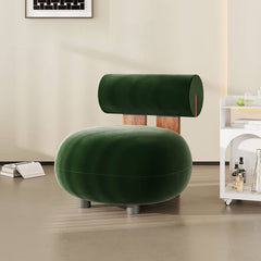 Olive green accent chair in a living room setting