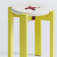 Vibrant blue accent stool in modern setting