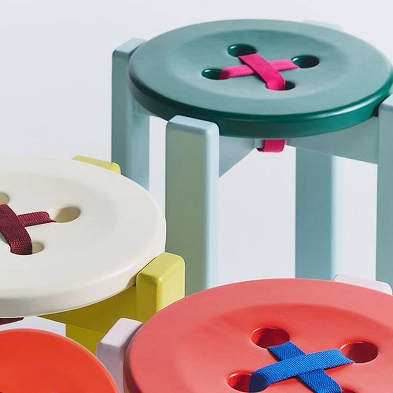 Functional white wood stool for additional seating