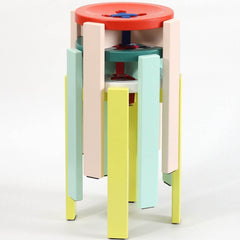 Stylish red stool for home decor