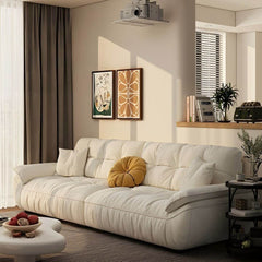 Water resistant fabric sofa with plush pillows