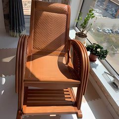 Close-up of upholstered front porch rocking chair