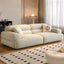 Chic off-white single sofa with biscuit back