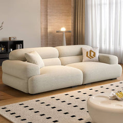 Chic off-white single sofa with biscuit back