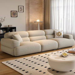 Versatile off-white sofa setup with decorative pillows