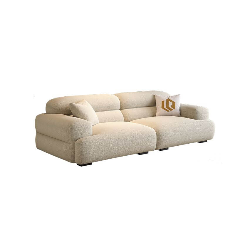 Chic off-white single sofa with biscuit back