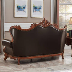 Brown loveseat with nailhead design