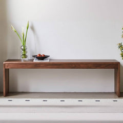 Brown wood dining bench with no upholstery