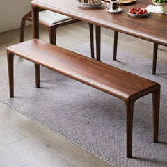 Cozy dining area with wood bench