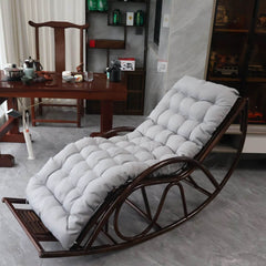 Modern indoor rocking chair with brown wooden legs